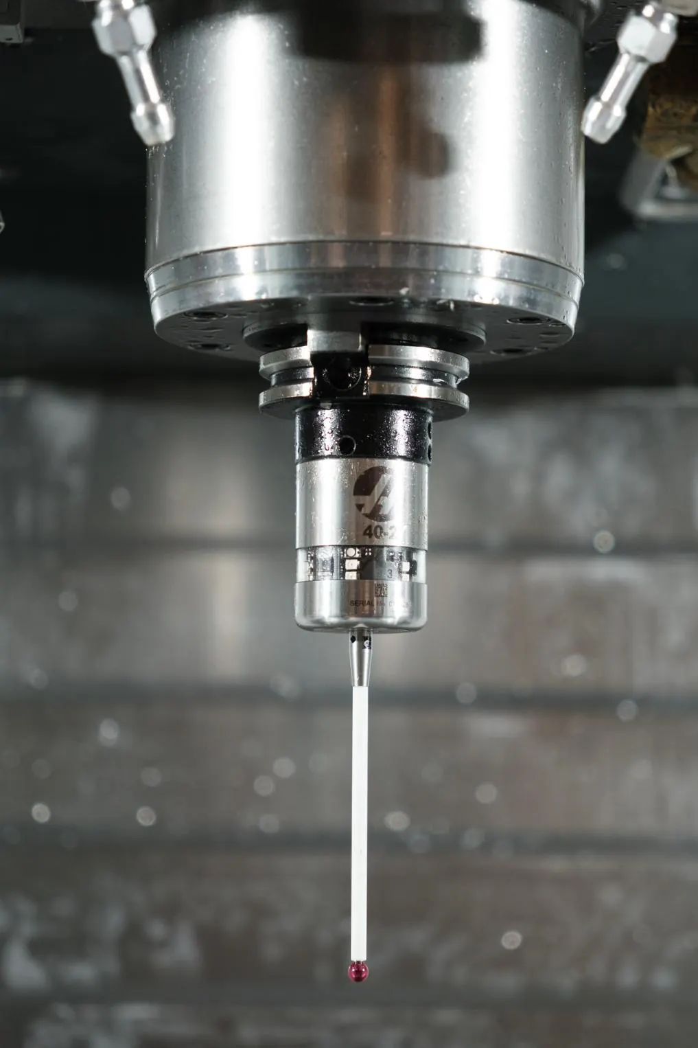 In-spindle touch probe verifying parts in the fixture